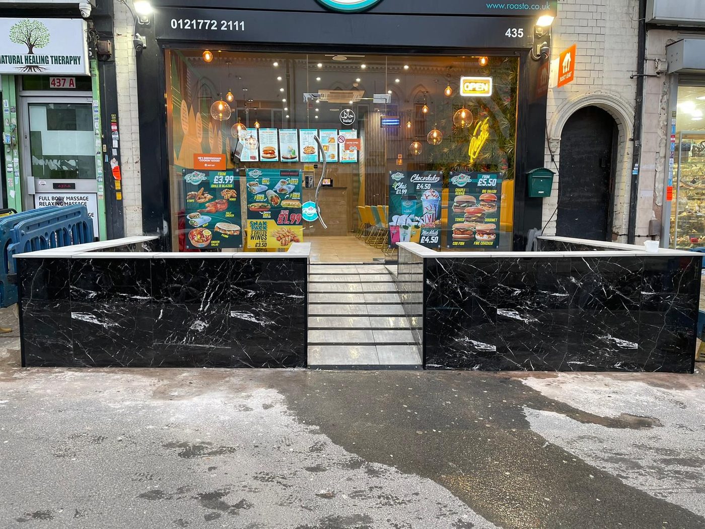Roller shutter and security front
